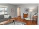 Comfortable living room features hardwood floors, stylish furniture, and ample natural light at 5982 S Aberdeen St, Littleton, CO 80120