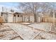 Backyard with snow on the ground at 2377 Cherry St, Denver, CO 80207
