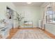 Cozy bedroom featuring decorative rug and bright natural light at 2377 Cherry St, Denver, CO 80207
