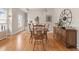 Formal dining room with hardwood floors, a classic dining table, and elegant decor, perfect for hosting dinner parties at 2377 Cherry St, Denver, CO 80207