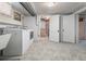 Basement laundry room with included washer and dryer at 2377 Cherry St, Denver, CO 80207