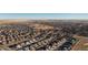 Wide aerial view of a large neighborhood, showing its layout and surrounding area at 16508 E 111Th Pl, Commerce City, CO 80022