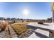 Backyard with patio and fire pit at 16508 E 111Th Pl, Commerce City, CO 80022