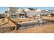 Backyard with playset, patio, and fenced area at 16508 E 111Th Pl, Commerce City, CO 80022