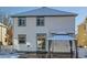 House exterior with snowy backyard and gazebo at 5224 Mt Arapaho Cir, Frederick, CO 80504