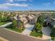 A stunning aerial view of the exterior of the home with professional landscaping and neighborhood at 5149 Le Duc Ln, Castle Rock, CO 80108