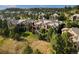 Aerial view of beautiful homes situated among mature trees in the community at 5149 Le Duc Ln, Castle Rock, CO 80108