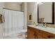 Full bathroom featuring wood cabinet with sink and shower tub combination at 5149 Le Duc Ln, Castle Rock, CO 80108
