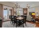 Open-concept dining area adjacent to a great room at 5149 Le Duc Ln, Castle Rock, CO 80108