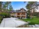Sprawling home featuring a tennis court and a multi-level back deck at 2130 Avenida Del Sol, Castle Rock, CO 80104