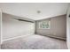 Bedroom with carpet, neutral paint and a window offering lots of natural light at 6545 S Balsam Ct, Littleton, CO 80123
