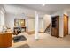 Finished basement space with a large bookshelf and office area at 5523 Stonewall Pl, Boulder, CO 80303