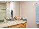 Bathroom featuring a vanity with beautiful counter tops and chrome fixtures at 5523 Stonewall Pl, Boulder, CO 80303