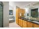 Modern bathroom with double sinks, a walk-in shower, and a soaking tub at 5523 Stonewall Pl, Boulder, CO 80303