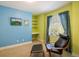 Inviting bedroom with a comfortable chair and built-in desk space at 5523 Stonewall Pl, Boulder, CO 80303