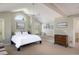 Serene bedroom with vaulted ceilings, natural light, and cozy window seat at 5523 Stonewall Pl, Boulder, CO 80303
