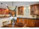 Spacious kitchen featuring stainless steel appliances and wooden cabinetry at 5523 Stonewall Pl, Boulder, CO 80303