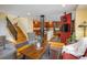 Inviting living room featuring hardwood floors and an open floor plan to the updated kitchen at 5523 Stonewall Pl, Boulder, CO 80303