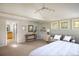 Large bedroom with plenty of natural light and a sitting area at 5523 Stonewall Pl, Boulder, CO 80303
