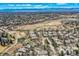 Aerial view of the community offering scenic views of the neighborhood and nearby mountains at 32 Silver Fox Cir, Greenwood Village, CO 80121
