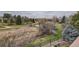 View of the marshy backyard, offering natural scenery and privacy at 32 Silver Fox Cir, Greenwood Village, CO 80121