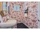 Stylish powder room with red floral wallpaper, vessel sink, and black tile flooring at 32 Silver Fox Cir, Greenwood Village, CO 80121