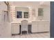 Bathroom with a vanity and bright lighting at 32 Silver Fox Cir, Greenwood Village, CO 80121