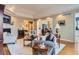 Open living space with hardwood floors and neutral tones perfect for entertaining at 32 Silver Fox Cir, Greenwood Village, CO 80121
