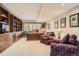 Well-lit office with built-in bookcases and a spacious desk, perfect for working from home at 32 Silver Fox Cir, Greenwood Village, CO 80121