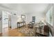 Living room featuring hardwood floors, neutral decor, and a bright open space at 1376 Ivanhoe St, Denver, CO 80220