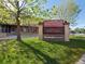 Louisville Middle School sign with a Band Concert announcement and a green lawn in front at 207 Short Pl, Louisville, CO 80027