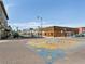 Downtown streetscape featuring art installations and historic buildings under a clear sky at 207 Short Pl, Louisville, CO 80027