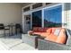 Cozy covered patio featuring comfortable outdoor seating and a view of the backyard at 1588 Blackwood Ct, Erie, CO 80516