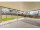 Covered patio extends into backyard with spacious area for entertainment and gardening at 1603 S Flanders Way, Aurora, CO 80017