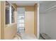 Basement storage featuring shelving and a window for natural light in the unfinished space at 1603 S Flanders Way, Aurora, CO 80017