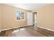 Bedroom with a window and an entry to another room at 1603 S Flanders Way, Aurora, CO 80017