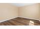 Bedroom with wood flooring and neutral walls at 1603 S Flanders Way, Aurora, CO 80017