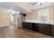 Well lit kitchen with stainless steel appliances and wood flooring at 1603 S Flanders Way, Aurora, CO 80017