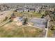 Aerial photo of a park offering a playground, basketball court, and walking paths in a Gathering-friendly community at 1603 S Flanders Way, Aurora, CO 80017