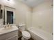 Well-lit bathroom featuring a shower and tub combination and single sink vanity at 6705 S Field St # 803, Littleton, CO 80128
