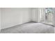 Bedroom with neutral carpet and sliding glass doors at 6705 S Field St # 803, Littleton, CO 80128