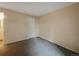A simple bedroom with neutral carpet and paint at 6705 S Field St # 803, Littleton, CO 80128
