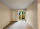 Empty bedroom with sliding glass door leading to balcony at 6705 S Field St # 803, Littleton, CO 80128