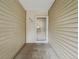 Inviting front entrance to the home with security door and vinyl siding at 6705 S Field St # 803, Littleton, CO 80128