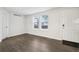 Bright living space with modern flooring, natural light, and neutral paint at 6705 S Field St # 803, Littleton, CO 80128