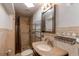 Cozy bathroom with tiled shower, granite counters, and modern fixtures at 2863 S Biscay Ct, Aurora, CO 80013