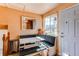 Bright breakfast nook with banquette seating and natural light from a window at 2863 S Biscay Ct, Aurora, CO 80013