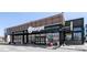 Commercial building with Target store featuring a modern design, ample parking, and clear signage at 6485 E Cedar Ave, Denver, CO 80224