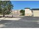 Exterior of storage unit building including parking and landscaping at 7152 S Blackhawk St # C12, Englewood, CO 80112