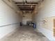 The inside of the unit features metal walls and ceiling with room for storage at 7152 S Blackhawk St # C12, Englewood, CO 80112